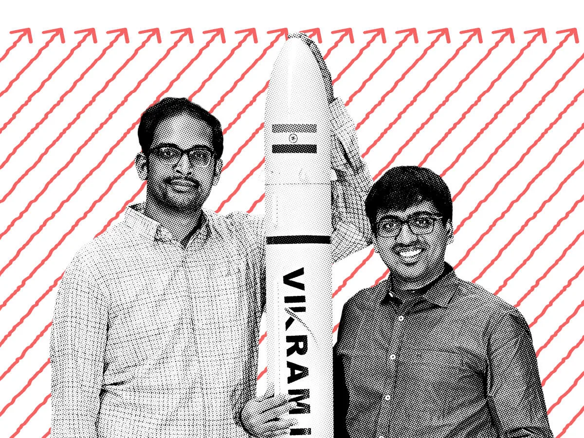 Skyroot Aerospace founders with a Vikram rocket model. Image: The Economic Times