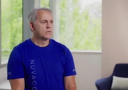 Person in Nuvacore shirt in the company team video thumbnail